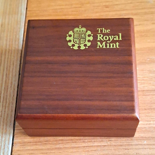 The royal mint wooden coin - the,